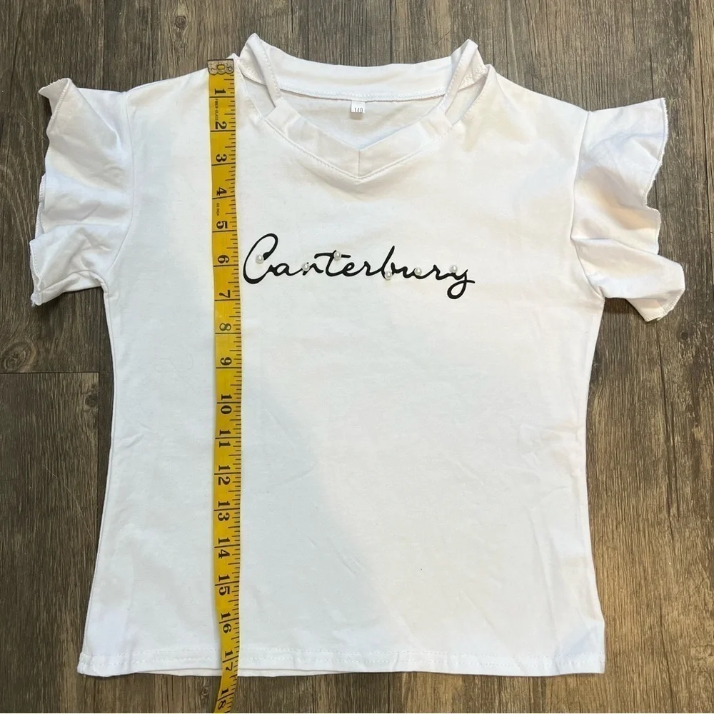 Girls Canterbury White Top With ruffle Short Sleeves Size 10